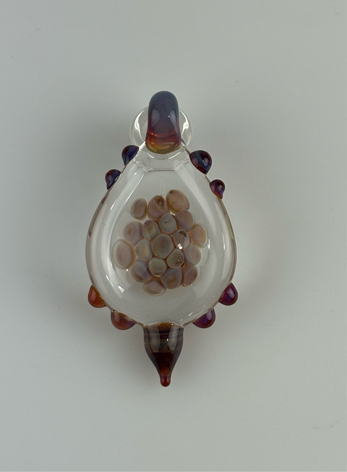 Loki’s Lipstick implosion pendant