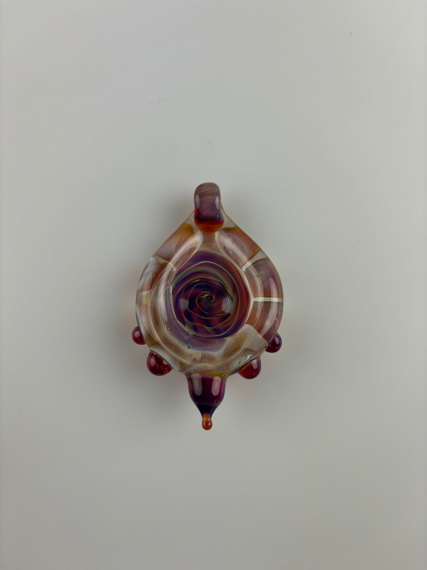 Loki’s Lipstick spiral pendant